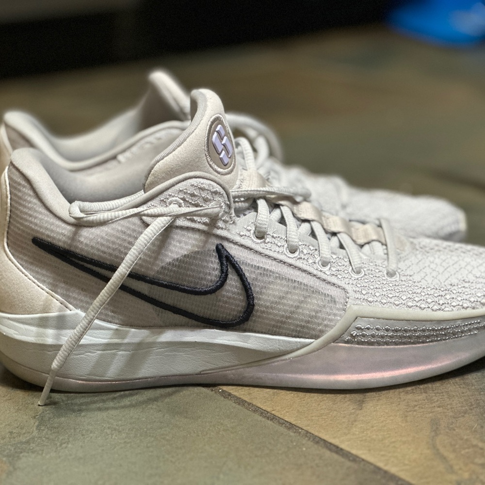 Nike Cream and Black Athletic Shoes
